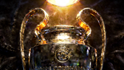 欧冠联赛奖杯特写 - 欧洲冠军联赛标志性的大耳朵杯在灯光下闪耀